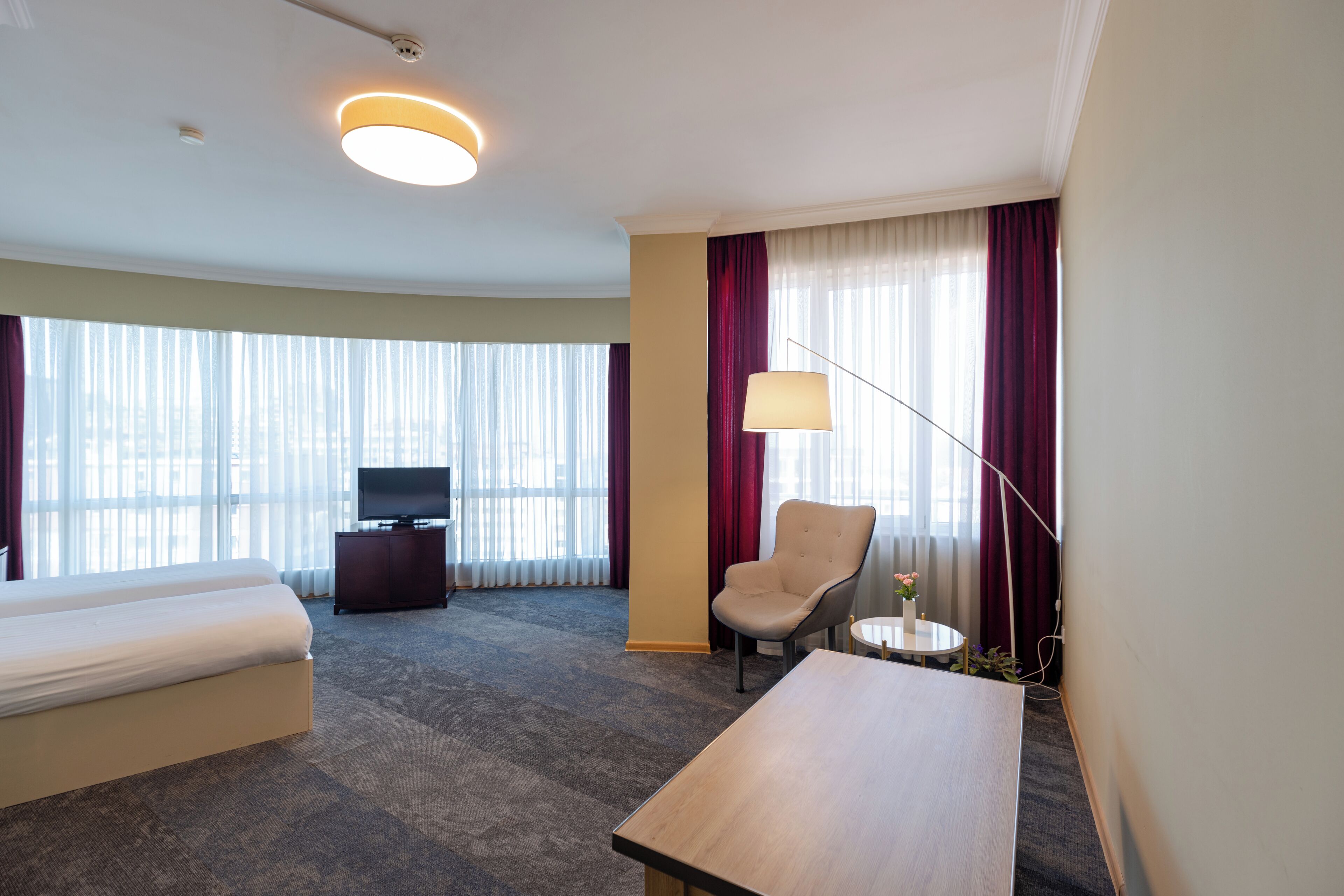 family room | premium bedding, memory-foam beds, minibar, in-room safe