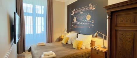 Classic Suite, 1 Bedroom, Kitchenette, City View | Premium bedding, in-room safe, individually decorated