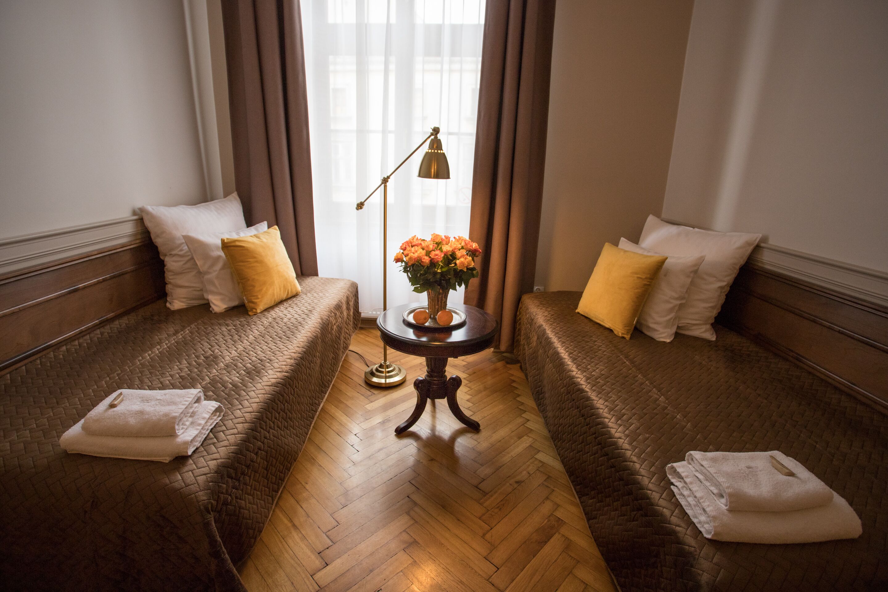 exclusive suite, 1 bedroom, kitchenette, city view | living area | 32-inch flat-screen tv with satellite channels, tv