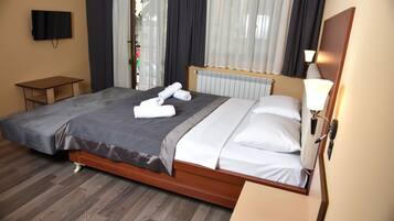 Premium bedding, down comforters, minibar, in-room safe