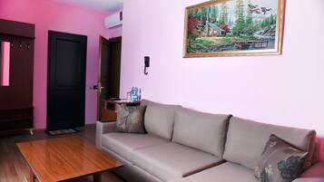 Grand Suite, 2 Bedrooms, Mountain View | Living area | 81-cm LCD TV with satellite channels, TV