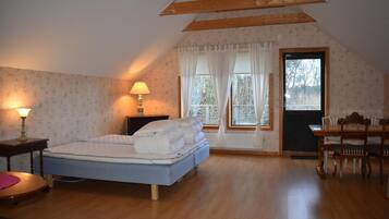 Triple Room, Shared Bathroom | Individually decorated, individually furnished, blackout curtains