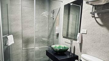 Shower, free toiletries, hair dryer, slippers