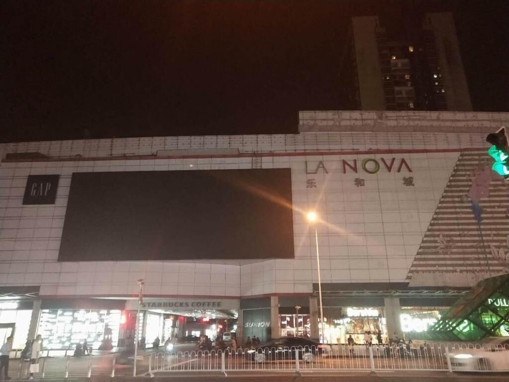 A large building with a sign reading "LA NOVA".