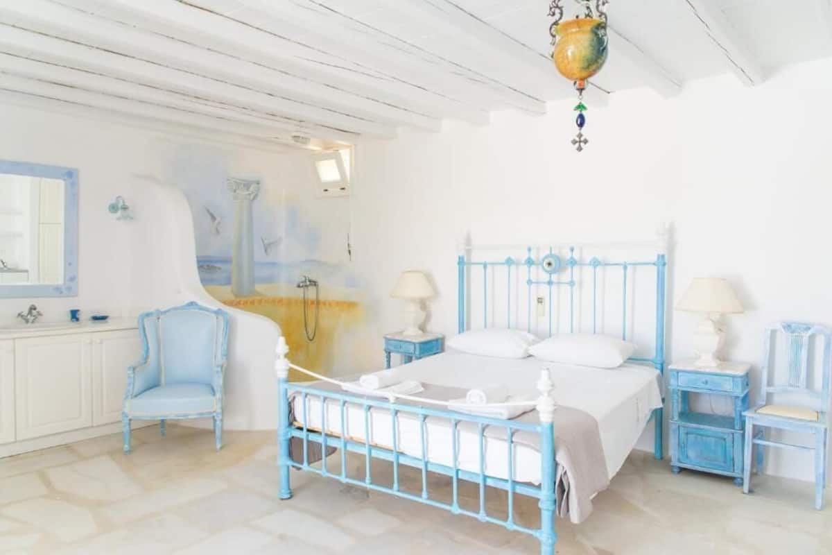Suite Deluxe, vue mer | 1 chambre, coffres-forts dans les chambres, fer et planche à repasser