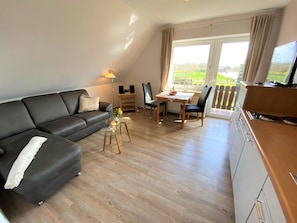 Standard Apartment, 1 Bedroom, Kitchen | Living area | Flat-screen TV