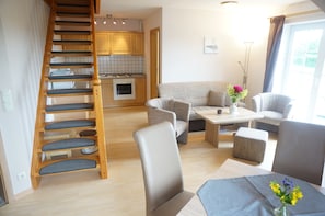 Family Apartment, 2 Bedrooms, Kitchen | Living area | Flat-screen TV