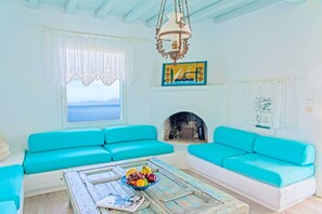 Villa, 4 Bedrooms, Private Pool, Sea View | Living room | Flat-screen TV, DVD player - Cavo Delos (Mykonos)
