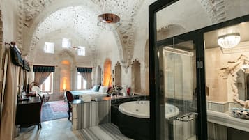 Premium bedding, down duvets, free minibar items, in-room safe