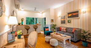 Eagle's Perch | Double Occupancy | Living area | 45-inch flat-screen TV with satellite channels, TV - Karma Chalets (Gurugram)