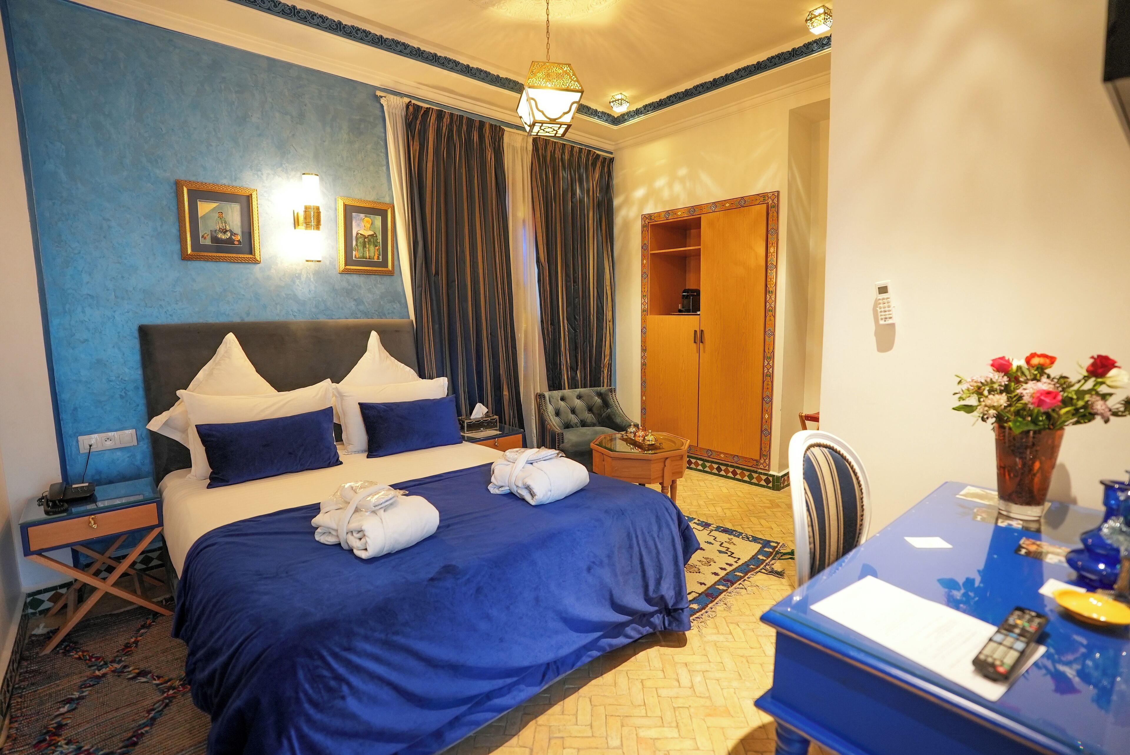 deluxe room | minibar, individually decorated, desk, blackout curtains