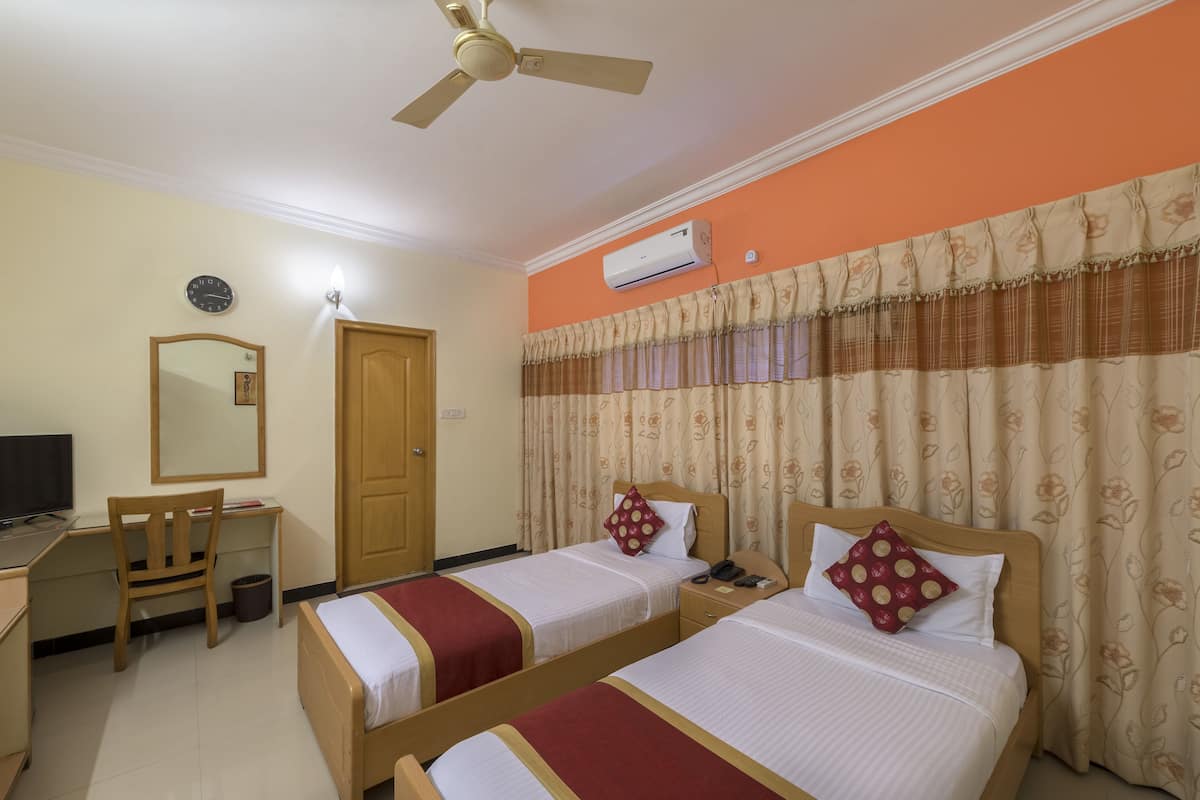 deluxe twin room, 2 single beds | premium bedding, desk, iron/ironing board, free wifi