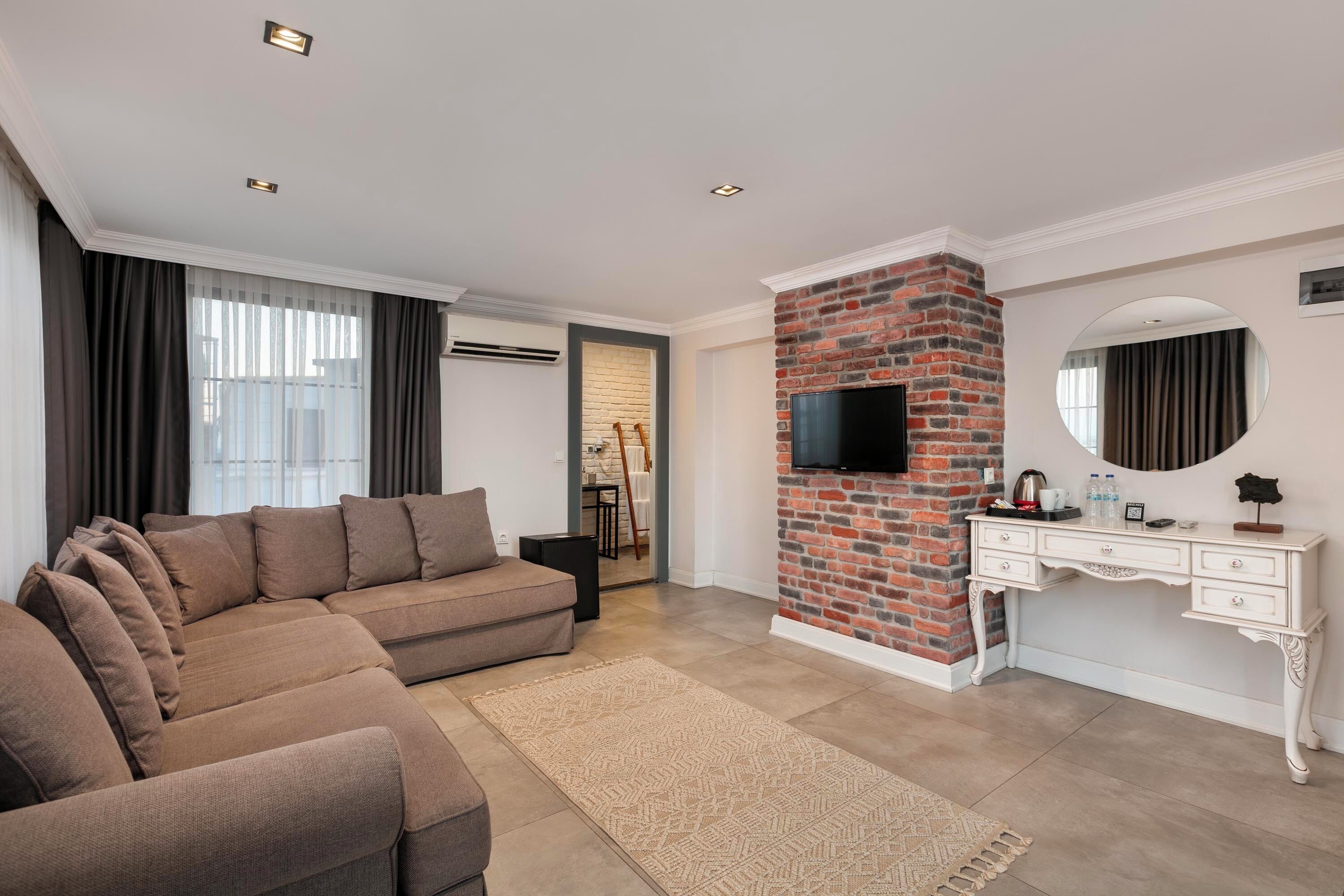 suite, jetted tub | 1 bedroom, premium bedding, minibar, in-room safe