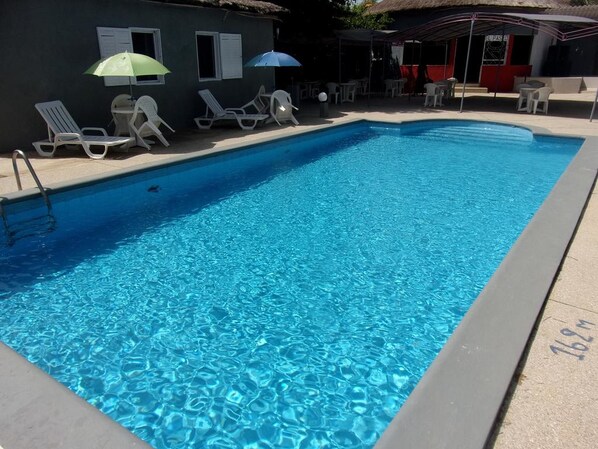 Outdoor pool, pool umbrellas, pool loungers