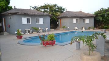 Outdoor pool, pool umbrellas, sun loungers