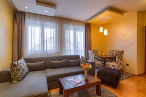 32-inch flat-screen TV with satellite channels, TV, DVD player