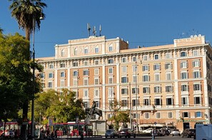 A large, historic building with multiple stories and a central courtyard. - Domus al Vaticano 36 (Rome)