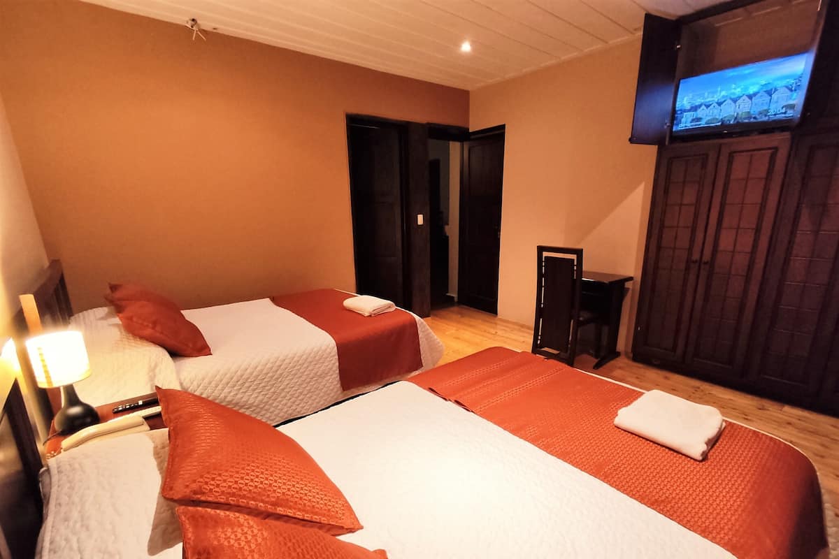 Premium bedding, down duvets, in-room safe, desk