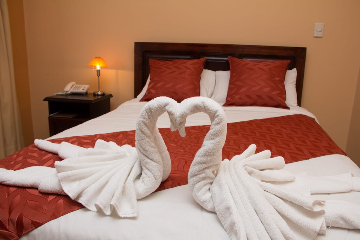Premium bedding, down duvets, in-room safe, desk