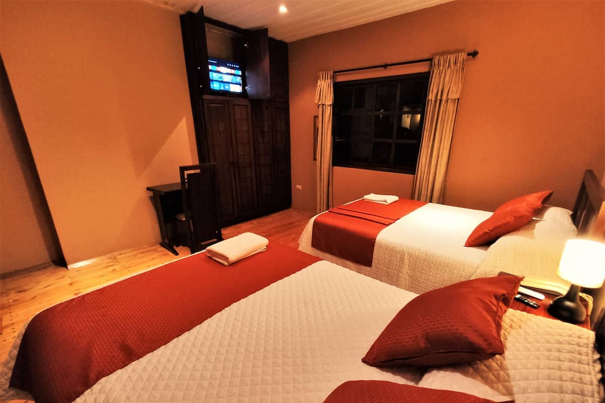 Premium bedding, down duvets, in-room safe, desk