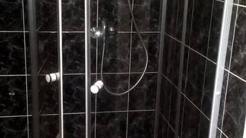 Shower, free toiletries, hair dryer, towels