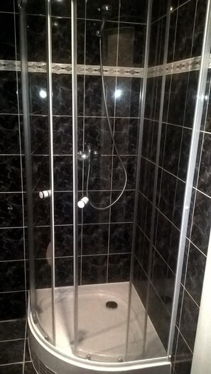 Shower, free toiletries, hair dryer, towels