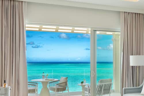 Suite, 1 trĂšs grand lit et 1 canapĂ©-lit, en front de plage | Vue sur la plage/lâocĂ©an