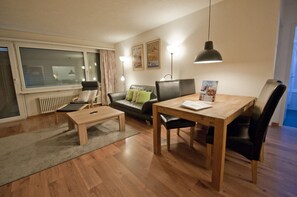 Apartment, 1 Bedroom | Living area | Flat-screen TV, DVD player