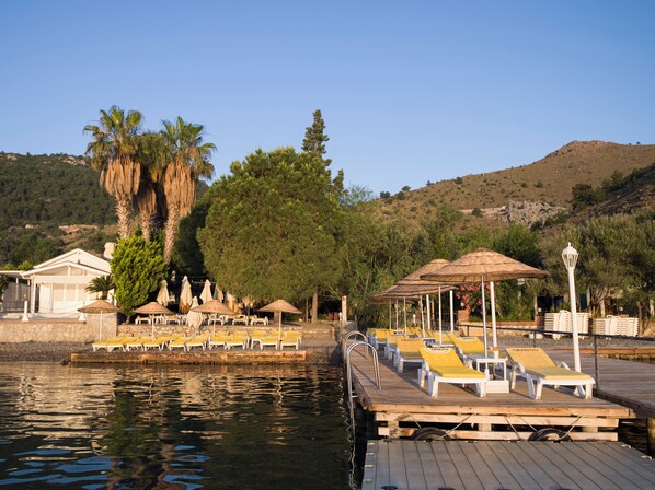 Private beach nearby, sun loungers, beach umbrellas, scuba diving