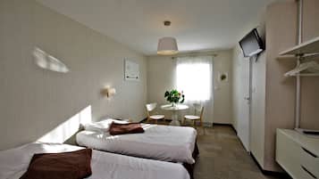 Habitación estándar con 2 camas individuales | Escritorio, insonorización, wifi gratis y ropa de cama