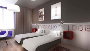 A modern hotel room with two beds, a large window, and a wall with a decorative pattern. - Go2Krynica - Gawra (Krynica-Zdroj)