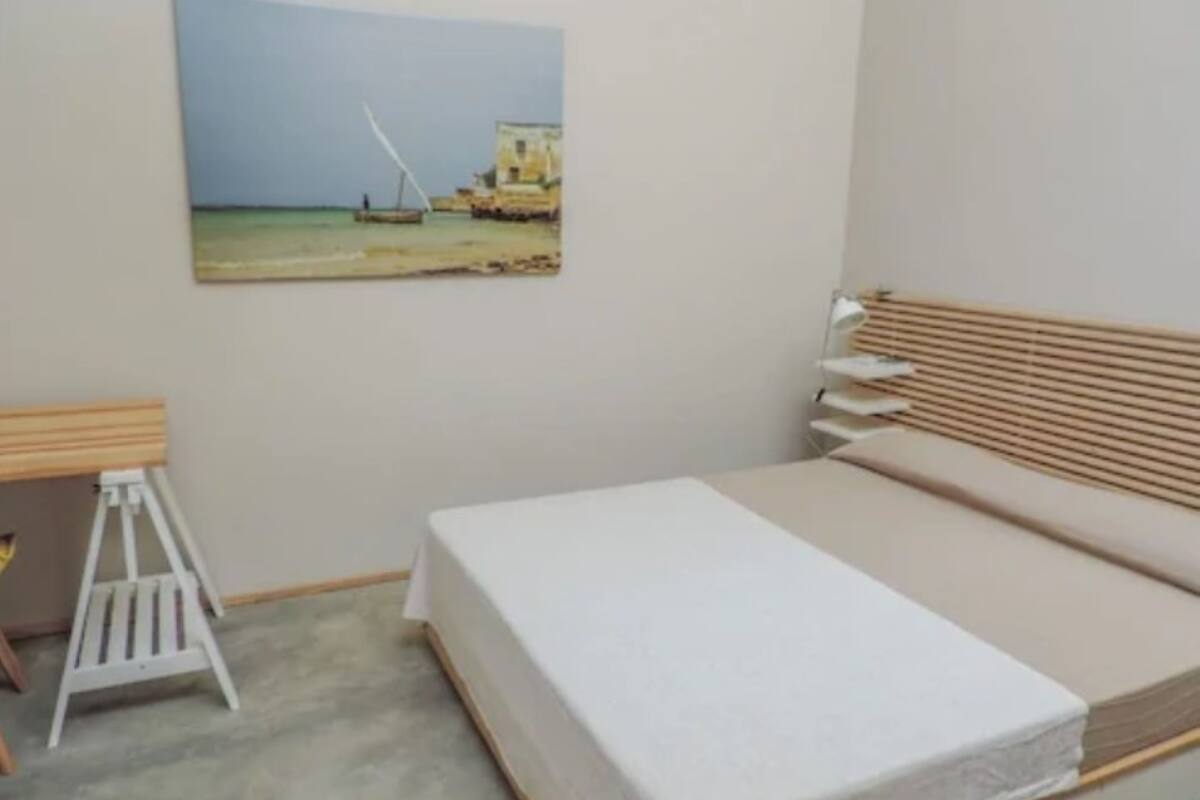 Casa standard, 1 cama King | 1 quarto, escrivaninha, ferros/tábuas de passar roupa, Wi-Fi de cortesia