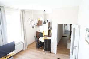 Deluxe Apartment, 2 Bedrooms, Balcony (Apt 3 - 76qm) | Living area | 45-inch flat-screen TV with satellite channels, TV, DVD player