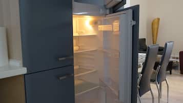 Deluxe Apartment, 2 Bedrooms, Balcony (Apt 2 - 74qm) | Private kitchen | Fridge, microwave, oven, stovetop