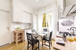 Shared fridge, microwave, cookware/dishes/utensils, freezer