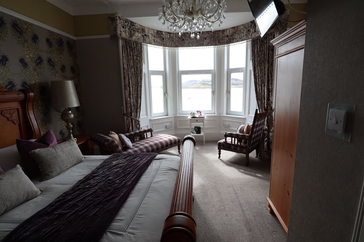 Premium bedding, blackout curtains, iron/ironing board, free WiFi