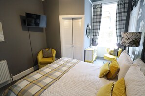 Premium bedding, blackout drapes, iron/ironing board, free WiFi