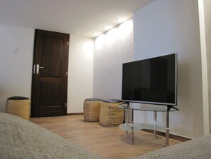 Apartamento design | Área de estar | TV de tela plana