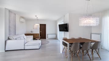 Comfort Apartment, 2 Bedrooms, River View | Living room | Flat-screen TV