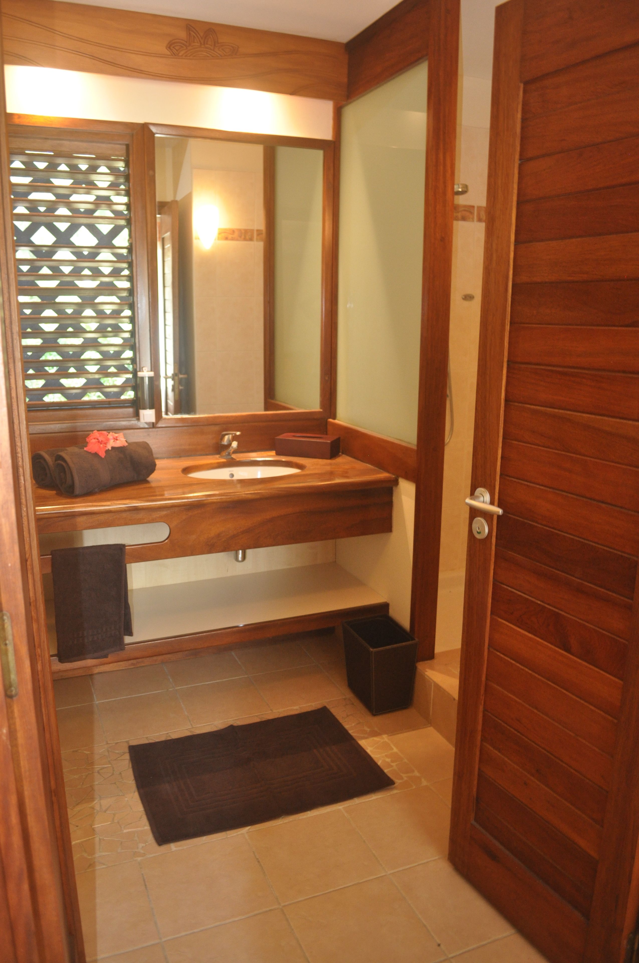 double room with garden view | bathroom | shower, free toiletries, hair dryer, towels