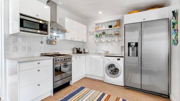Cottage, 2 Bedrooms | Private kitchen | Full-size fridge, microwave, oven, stovetop