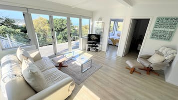 Cottage, 2 Bedrooms | Living area | 32-inch LCD TV with satellite channels, TV