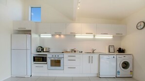 Villa, 2 Bedrooms | Private kitchen | Fridge, microwave, oven, stovetop - The Apartment at Palm Beach (Waiheke Island)