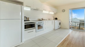 Villa, 2 Bedrooms | Private kitchen | Fridge, microwave, oven, stovetop - The Apartment at Palm Beach (Waiheke Island)