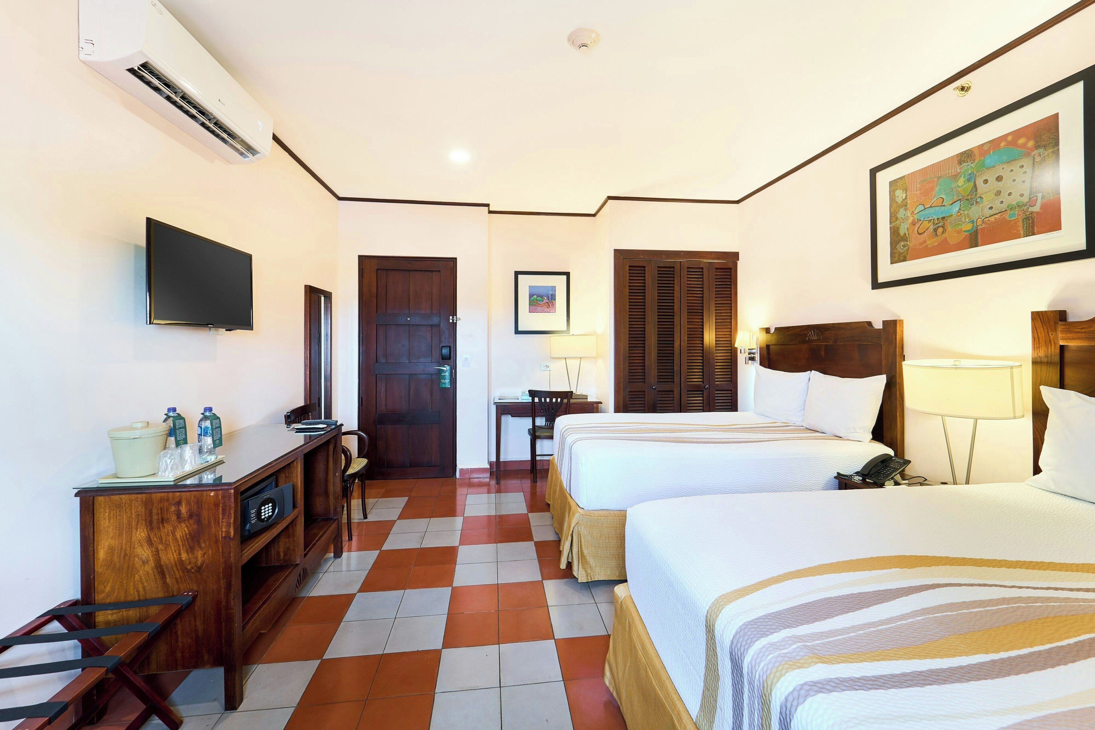 Room, 2 Double Beds, Balcony | In-room safe, desk, free WiFi