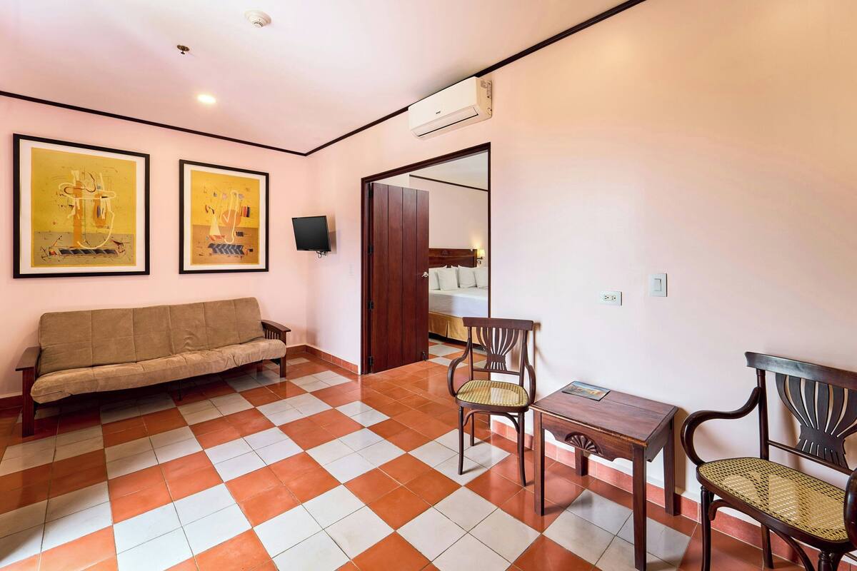 Suite, 1 Bedroom, Balcony | In-room safe, desk, WiFi (free)