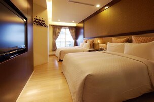 Desk, blackout curtains, soundproofing, rollaway beds