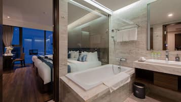 Suite Triple Balcony Room | Bathroom | Separate tub and shower, rainfall showerhead, designer toiletries