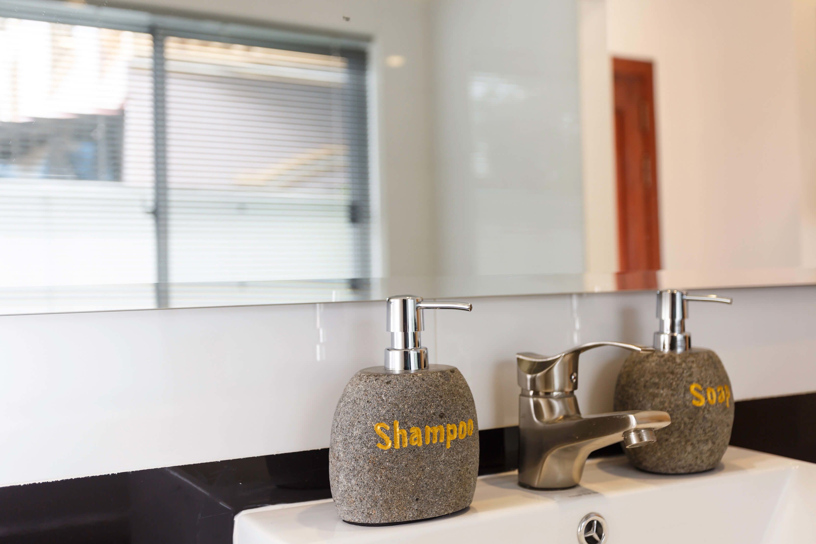 family room | bathroom amenities | separate bathtub and shower, free toiletries, towels