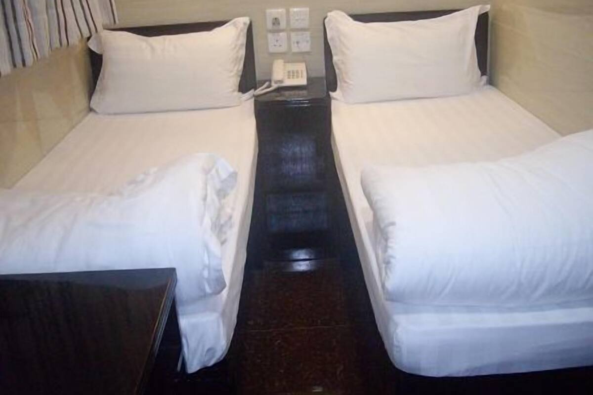 Twin Room | Iron/ironing board (on request), WiFi (free)